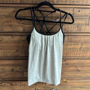 Athleta size small grey workout, top with built-in bra and flow he shirt